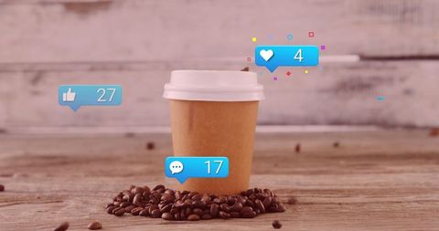 Coffee Cup on Wooden Table with Social Media Engagement Icons