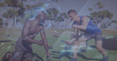 Fitness Enthusiasts Sharing Workout Data Outdoors