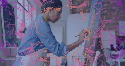 Female Artist Painting on Easel with Augmented Reality Effect