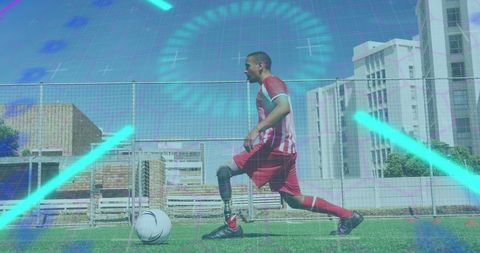 Biracial Man Playing Soccer on Urban Field