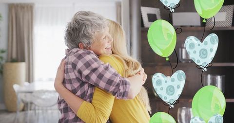 Mother and Daughter Heartfelt Hug with Festive Balloons - Download Free Stock Images Pikwizard.com