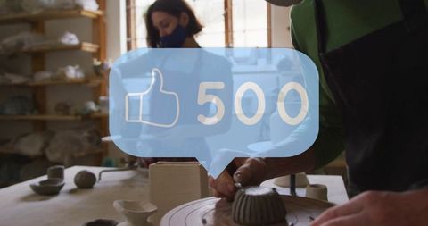 Potter shaping clay bowl with social media engagement icon overlay