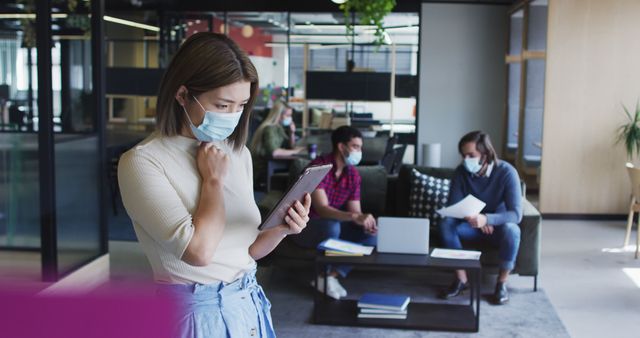 Office Workers Wearing Masks Discussing Technology and Planning - Download Free Stock Images Pikwizard.com