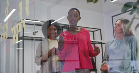 Confident Businesswoman Leading Team in Modern Office Meeting - Download Free Stock Images Pikwizard.com