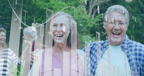 Mature couple laughing in park with financial charts and data overlays for retirement