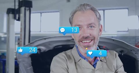 Mechanic in Auto Shop with Social Media Interaction Overlay
