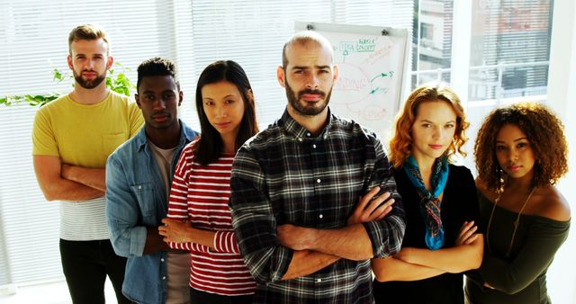 Diverse Group of Young Professionals with Folded Arms - Download Free Stock Images Pikwizard.com