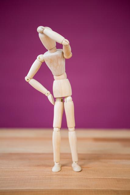 Figurine holding an electric bulb - Download Free Stock Photos Pikwizard.com