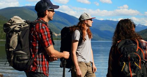 Group of Young Adults Hiking Near Scenic Mountain Lake - Download Free Stock Images Pikwizard.com