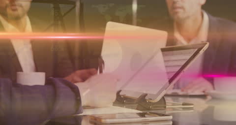 Business Team Collaborating Over Digital Financial Data