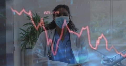 Masked Doctor Examining Graph in Modern Hospital Environment