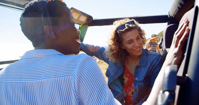 Friends Enjoying Road Trip in Sunlit Convertible Jeep - Download Free Stock Images Pikwizard.com