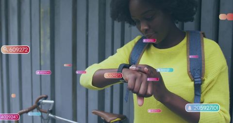 Digital Connections: African American Woman Navigating Smartwatch Data