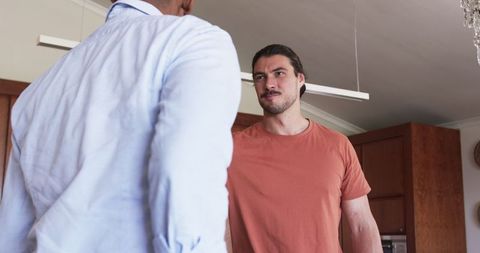 Friends Interacting in Modern Kitchen for Gathering