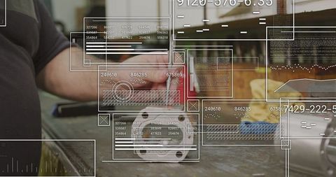 Technician Analyzing Component with Digital Data Overlay