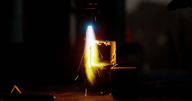 Close-up of Welding Torch with Sparks in Industrial Setting - Download Free Stock Images Pikwizard.com