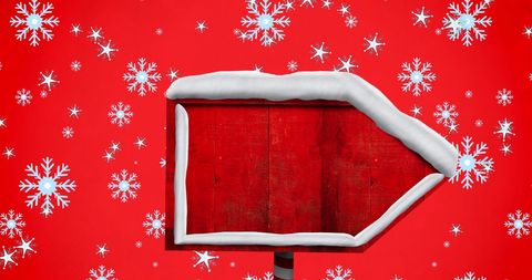 Christmas snowflakes with blank wooden sign for holiday messages