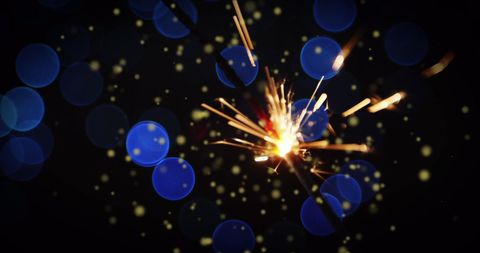 Vibrant Fireworks Burst with Blue Bokeh Lights - Download Free Stock Images Pikwizard.com