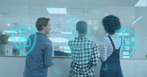 Technology Team Planning Cybersecurity Strategy with Digital Interface Overlay