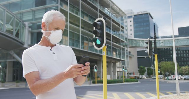 Mature Man Wearing Face Mask Using Smartphone Outdoors - Download Free Stock Images Pikwizard.com