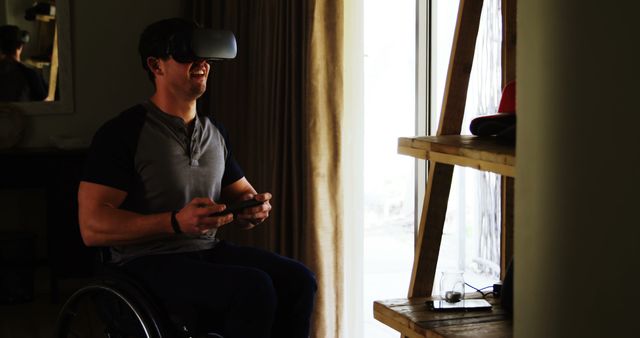 Man in Wheelchair Using VR Headset for Gaming at Home - Download Free Stock Images Pikwizard.com