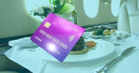 Luxury airline dining with floating purple bank card concept