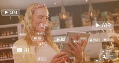 Smiling Woman Engaging with Tablet in Retail Store Surrounded by Social Media Icons