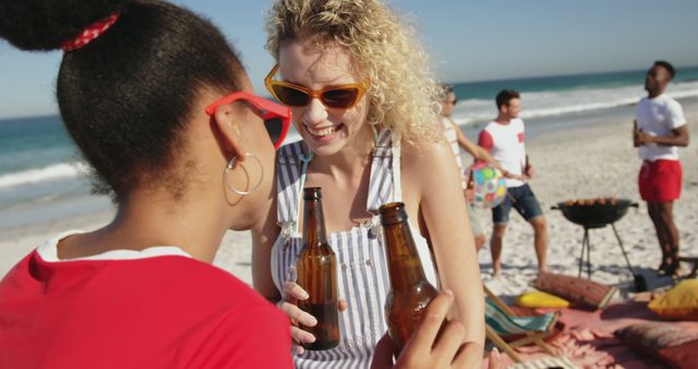 Young Friends Enjoying a Beach Party with Drinks and Barbecue - Download Free Stock Images Pikwizard.com