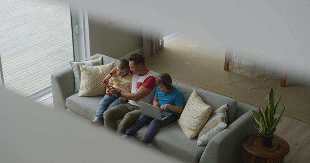 Father Spending Quality Time with Children on Couch - Download Free Stock Images Pikwizard.com