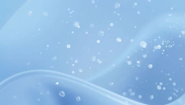 Flowing cerulean wave with translucent droplets and soft bokeh gradient background