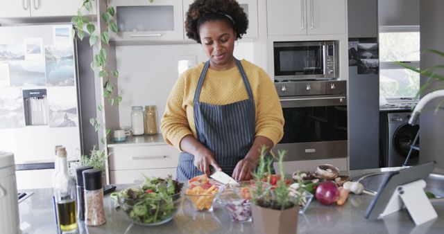 Smiling Woman Preparing Healthy Vegan Meal in Modern Kitchen - Download Free Stock Images Pikwizard.com