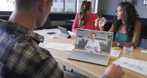 Business Team Video Conferencing in Modern Office