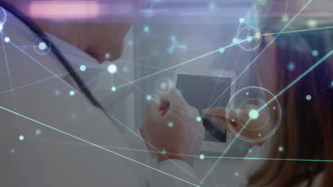 Innovative Medical Technology: Doctors Utilizing Tablet and Network