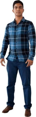 Confident young man in stylish blue plaid shirt transparent background
