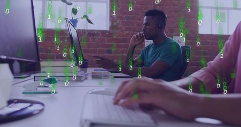 Coworking Developer Pointing at Monitor with Headset and Floating Binary Code Overlay