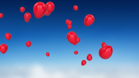 Bright Red Balloons Floating in Blue Sky