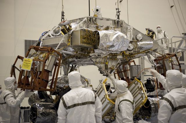 Technicians Lowering Descent Stage Over Mars Curiosity Rover for Integration - Download Free Stock Images Pikwizard.com