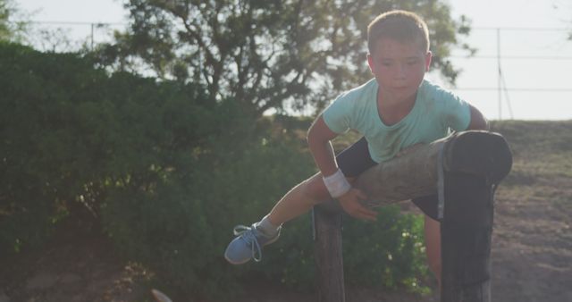 Child Overcoming Obstacle on Outdoor Playground - Download Free Stock Images Pikwizard.com