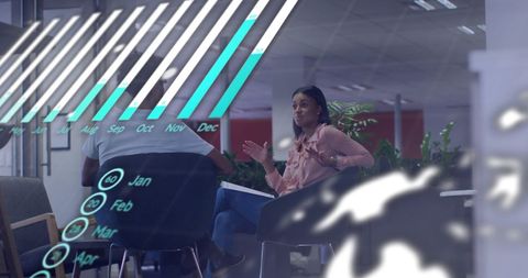 Business Analytics Discussion with Colleagues in Office Setting