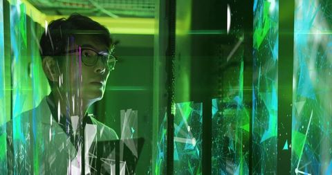 Technology expert overseeing digital networks in server room