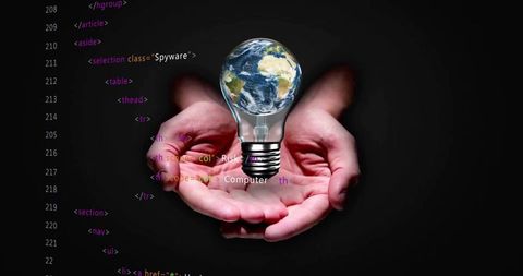 Holding hands cradling earth lightbulb with code overlay representing cybersecurity