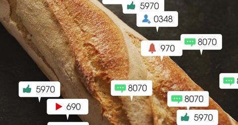 Rustic baguette with social notification overlays and engagement icons, marketing concept