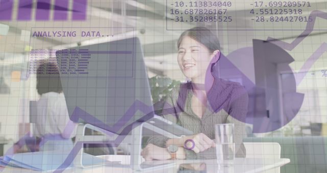 Smiling Businesswoman Analyzing Data on Computer With Graphs Overlaid - Download Free Stock Images Pikwizard.com