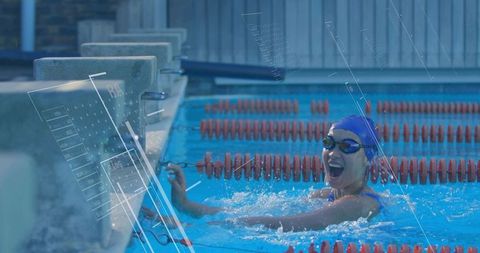 Competitive swimmer reaching wall during aquatic training