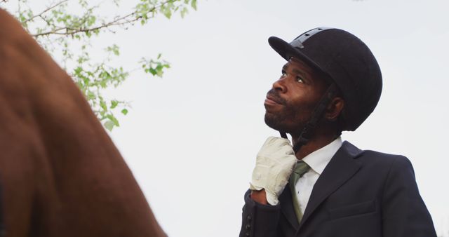 Equestrian Man Adjusting Helmet Before Horse Ride - Download Free Stock Images Pikwizard.com