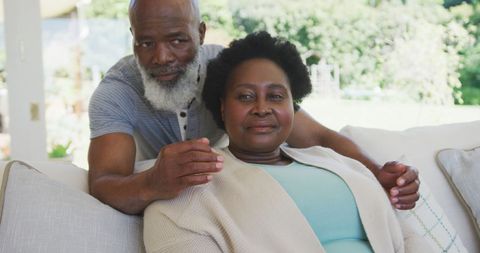 Senior African American Couple Enjoying Quality Time on Couch - Download Free Stock Images Pikwizard.com