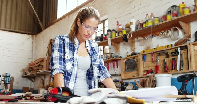 Female Woodworker Designing Project in Workshop - Download Free Stock Images Pikwizard.com