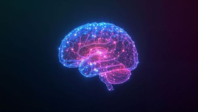 Glowing wireframe brain emitting neon blue and pink light with glowing neural network