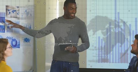 Business professional presenting data with digital projections