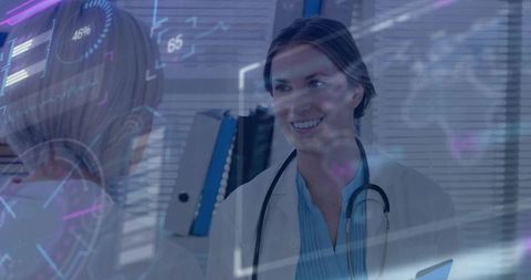 Woman Clinician Smiling with Stethoscope and Tablet Showing Futuristic Medical HUD Overlays